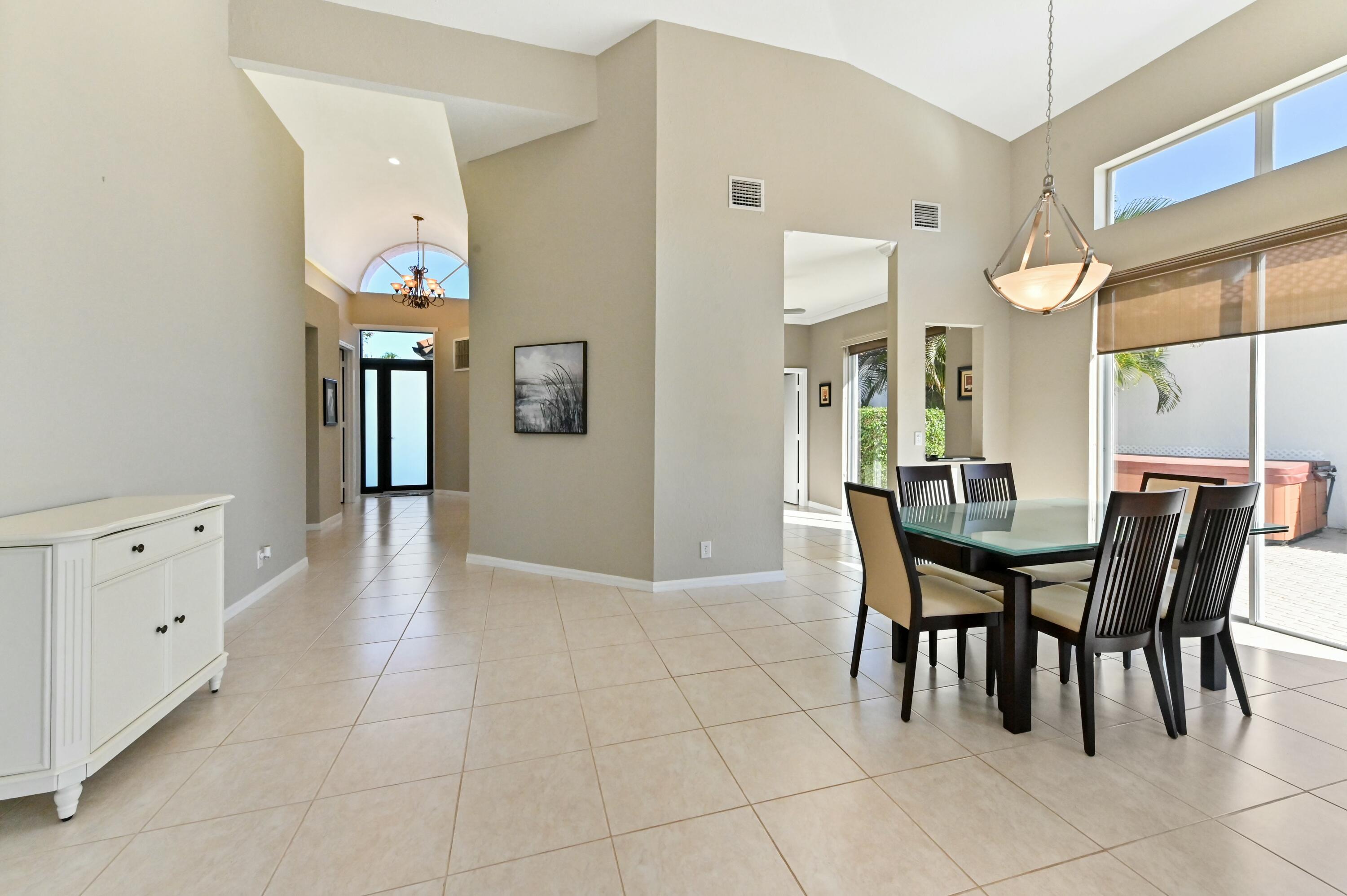 17272 Hampton Boulevard Boca Raton, FL 33496 - Photo 10 of 33 a view of a dining room with furniture