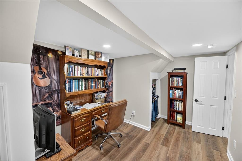 76 Walker Road Northwest Cartersville, GA 30121 - Photo 19 of 33 a view of a workspace with furniture