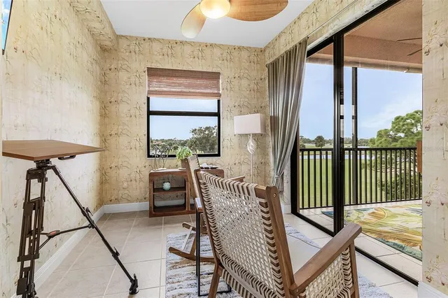 a view of a balcony with furniture