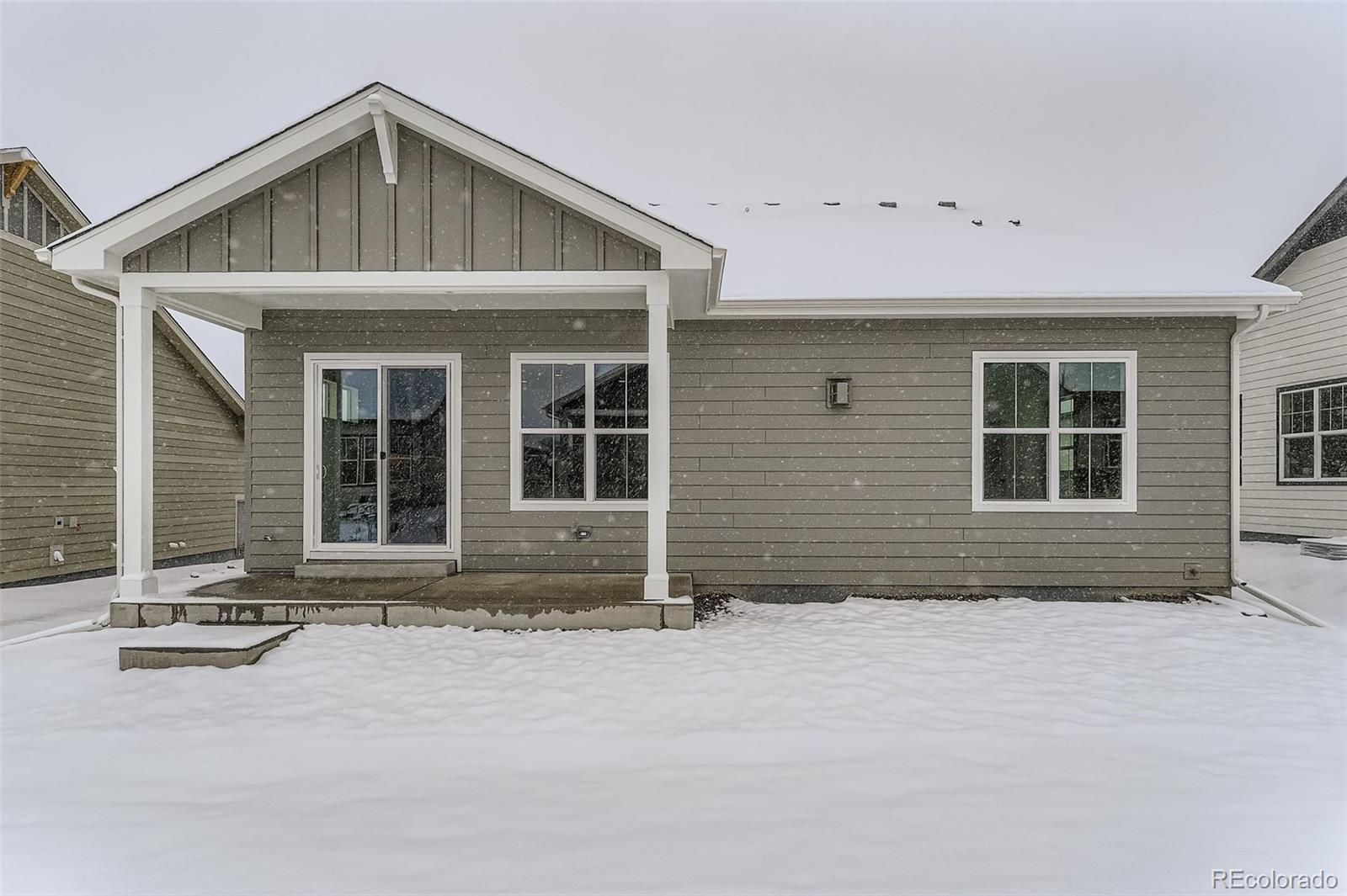 8942 South Riviera Way Aurora, CO 80016 - Photo 29 of 29 a front view of a house with a yard