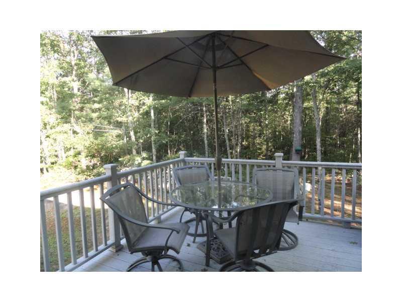 129 Green Road Wells, ME 04090 - Photo 4 of 11 Patio/Deck. Sliders directly off...