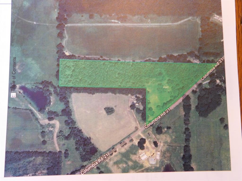 2600 Columbia 21 Road Taylor, AR 71861 - Photo 1 of 15 a aerial view of a house with a yard and lake view