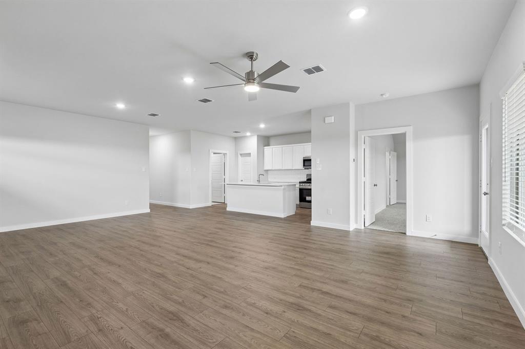 1140 Del Rio Drive Lavon, TX 75166 - Photo 31 of 32 Open Floor Plan in the Oscar home plan by Trophy Signature Homes – REPRESENTATIVE PHOTO
