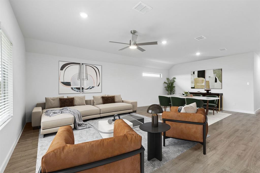 1140 Del Rio Drive Lavon, TX 75166 - Photo 12 of 32 Living and Dining Rooms in the Oscar home plan by Trophy Signature Homes – REPRESENTATIVE PHOTO