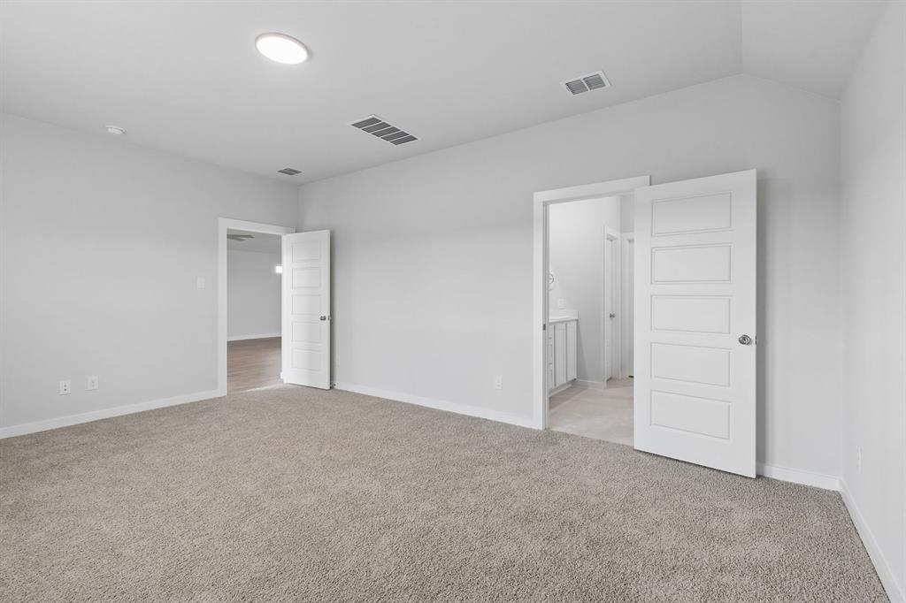 1140 Del Rio Drive Lavon, TX 75166 - Photo 15 of 32 Primary Suite in the Oscar home plan by Trophy Signature Homes – REPRESENTATIVE PHOTO
