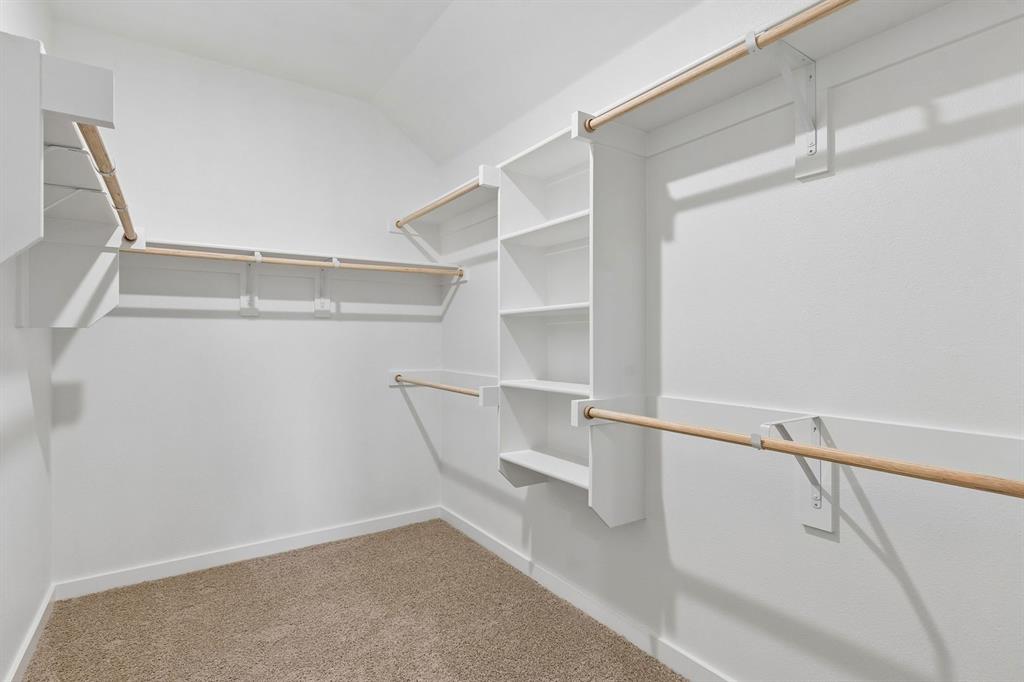 1140 Del Rio Drive Lavon, TX 75166 - Photo 19 of 32 Primary Closet in the Oscar home plan by Trophy Signature Homes – REPRESENTATIVE PHOTO