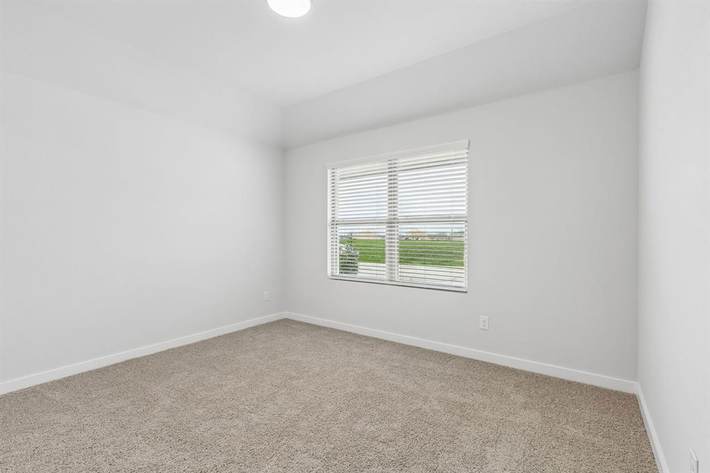 1140 Del Rio Drive Lavon, TX 75166 - Photo 22 of 32 Bedroom in the Oscar home plan by Trophy Signature Homes – REPRESENTATIVE PHOTO