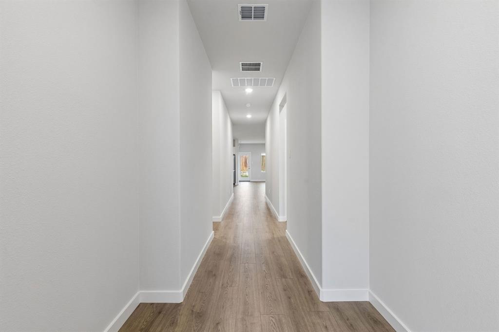 1140 Del Rio Drive Lavon, TX 75166 - Photo 25 of 32 Entryway in the Oscar home plan by Trophy Signature Homes – REPRESENTATIVE PHOTO