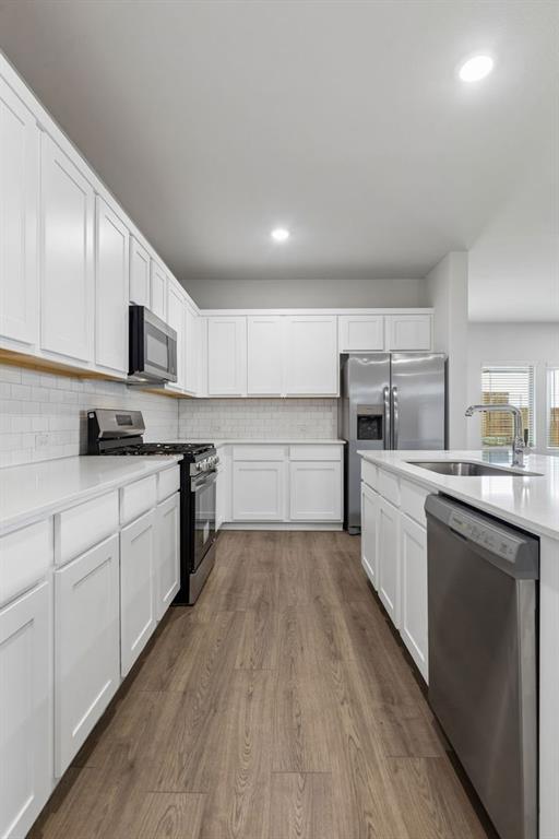 1140 Del Rio Drive Lavon, TX 75166 - Photo 8 of 32 Kitchen in the Oscar home plan by Trophy Signature Homes – REPRESENTATIVE PHOTO