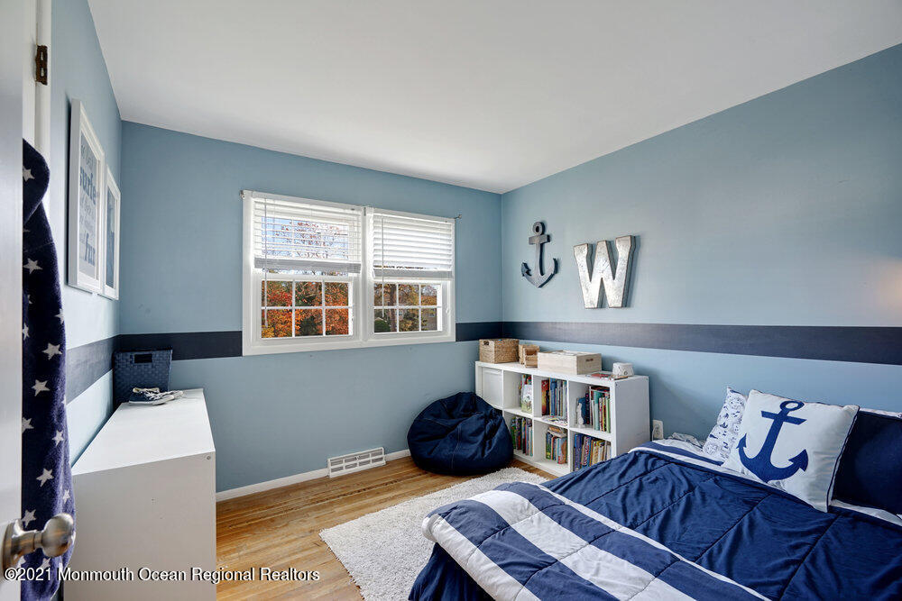 557 Summit Drive Point Pleasant, NJ 08742 - Photo 27 of 41 a bedroom with furniture and a window