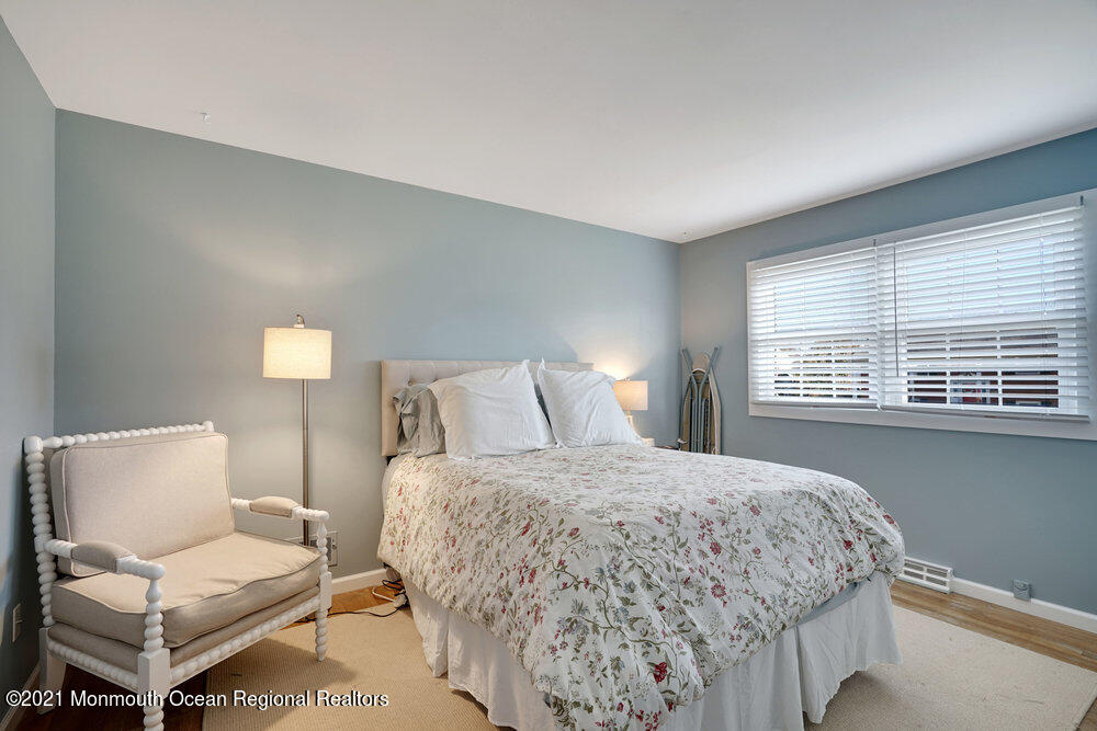 557 Summit Drive Point Pleasant, NJ 08742 - Photo 28 of 41 a bedroom with a bed and a couch