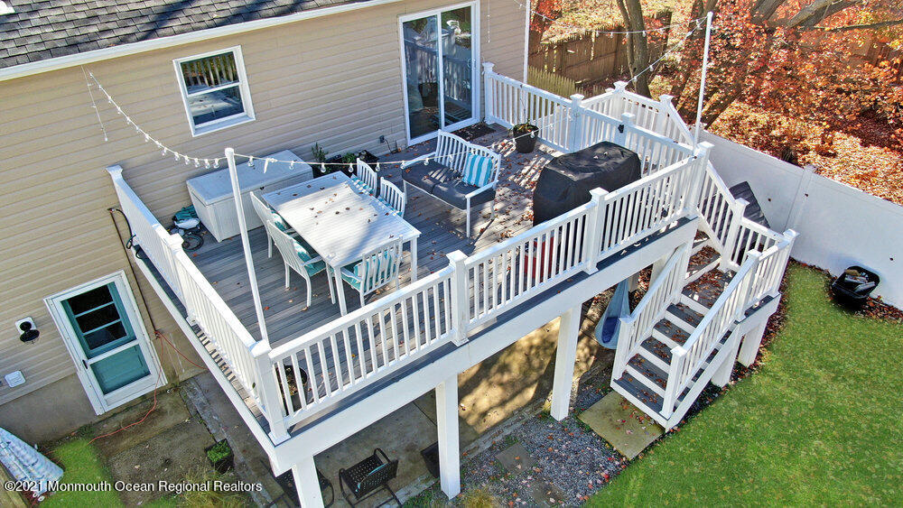 557 Summit Drive Point Pleasant, NJ 08742 - Photo 29 of 41 a view of a house with backyard and deck