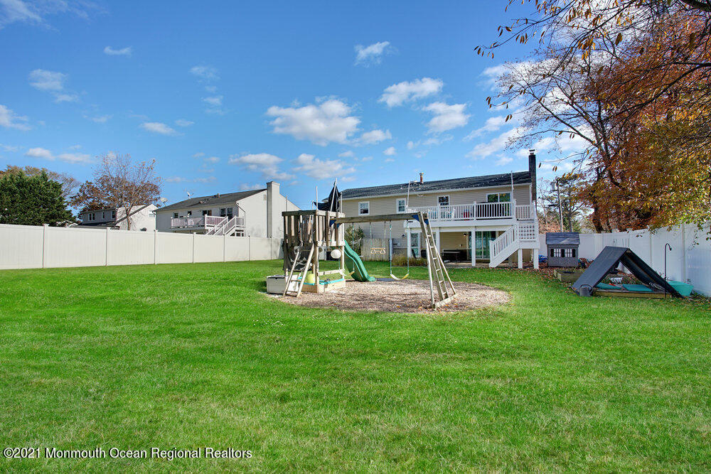 557 Summit Drive Point Pleasant, NJ 08742 - Photo 34 of 41 a view of a house with backyard and a tree