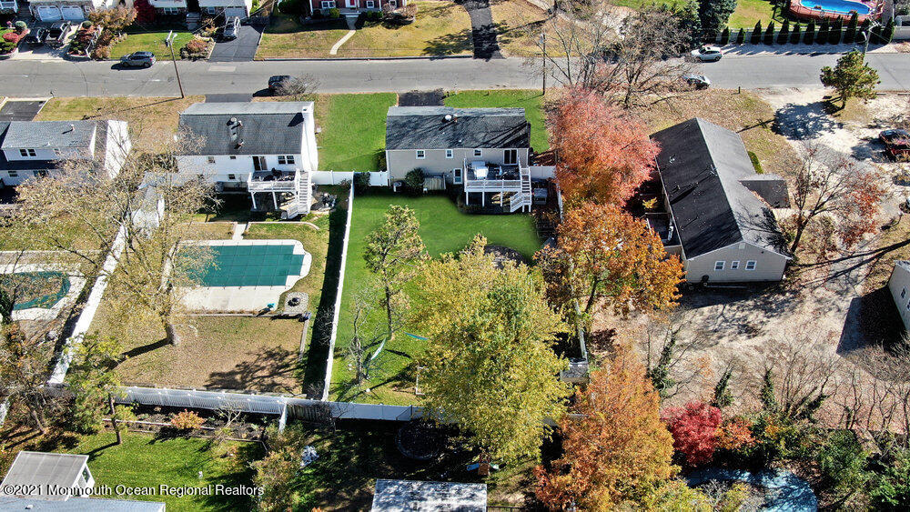 557 Summit Drive Point Pleasant, NJ 08742 - Photo 38 of 41 an aerial view of residential house with outdoor space and swimming pool