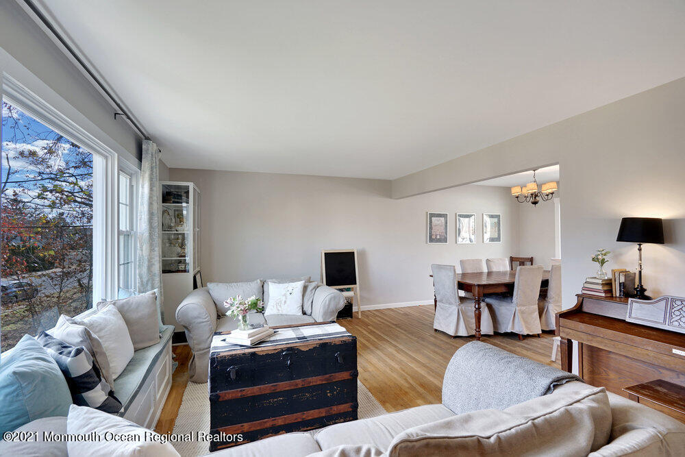 557 Summit Drive Point Pleasant, NJ 08742 - Photo 5 of 41 a living room with furniture and a flat screen tv