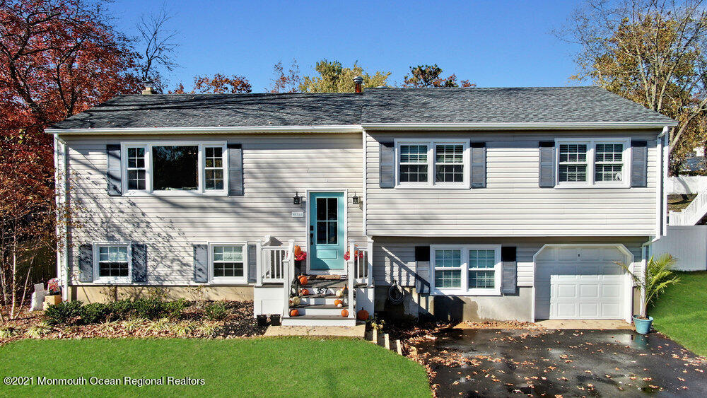 557 Summit Drive Point Pleasant, NJ 08742 - Photo 41 of 41 a view of a house with a yard