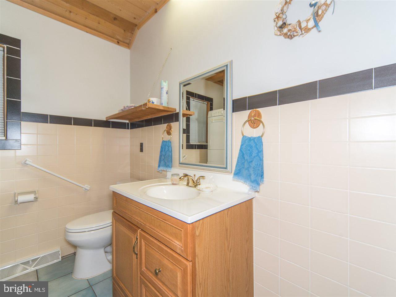 6322 York Road Spring Grove, PA 17362 - Photo 11 of 35 a bathroom with a sink and a mirror