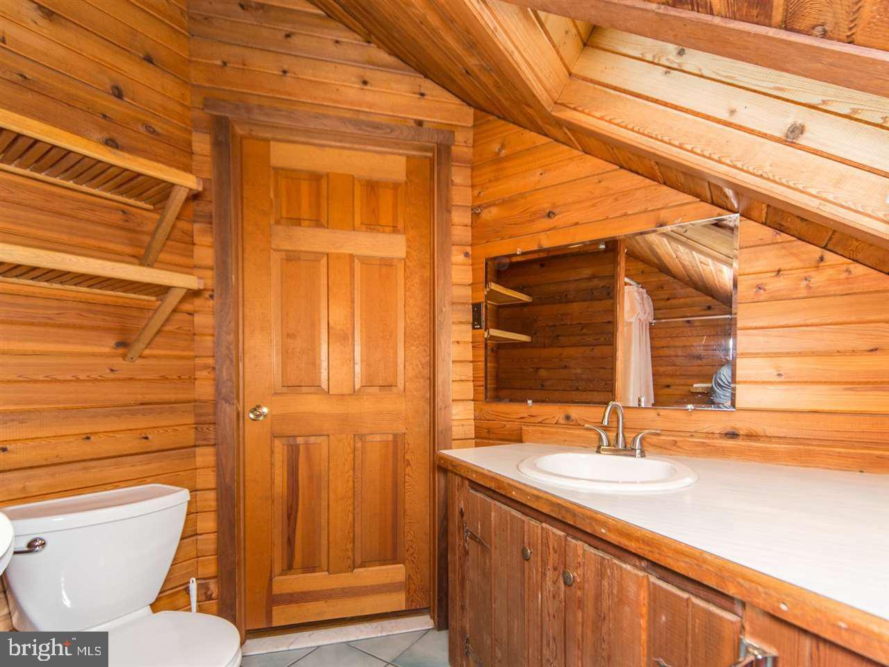 6322 York Road Spring Grove, PA 17362 - Photo 24 of 35 a bathroom with a sink a toilet and shower
