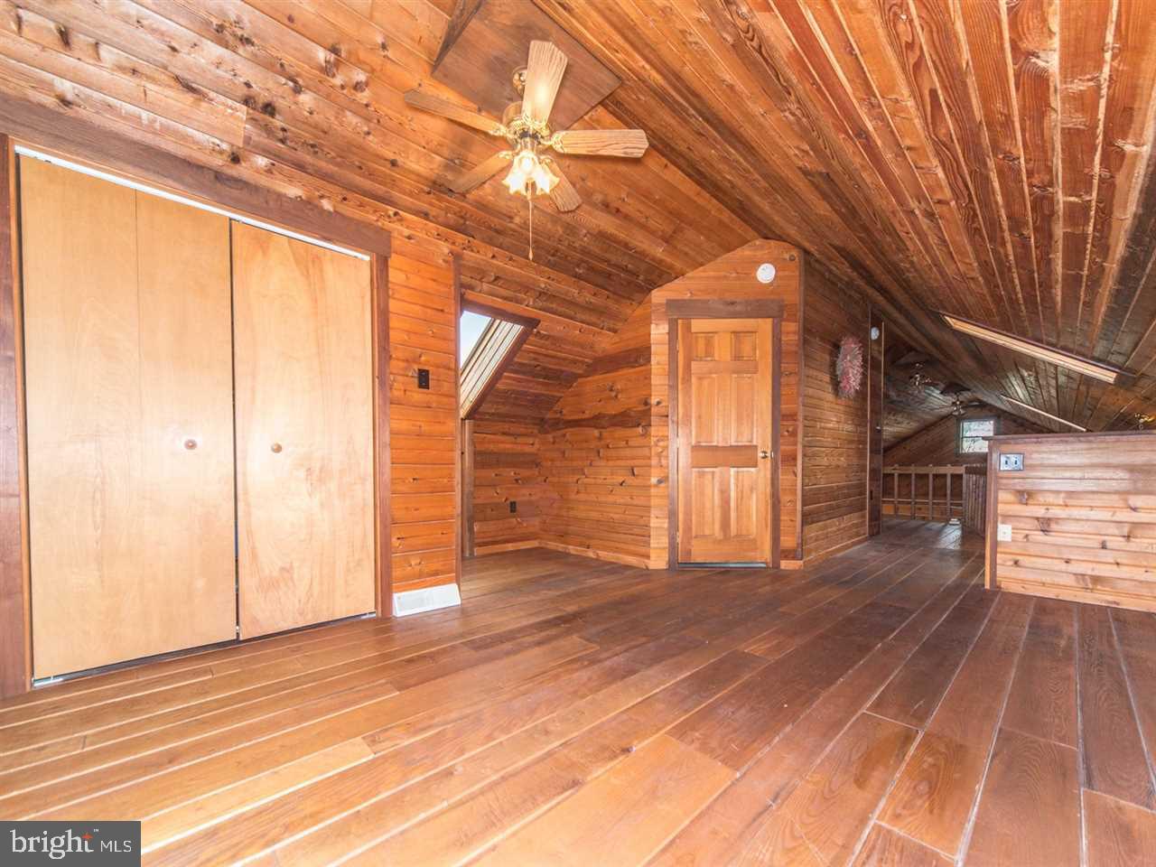 6322 York Road Spring Grove, PA 17362 - Photo 26 of 35 a view of empty room with wooden floor and windows