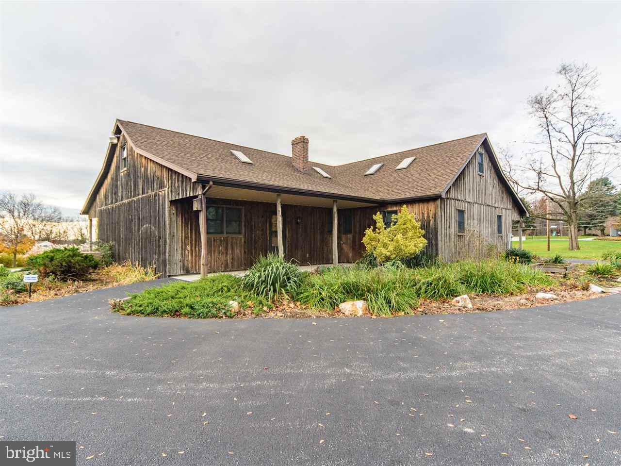 6322 York Road Spring Grove, PA 17362 - Photo 28 of 35 a front view of a house with garden