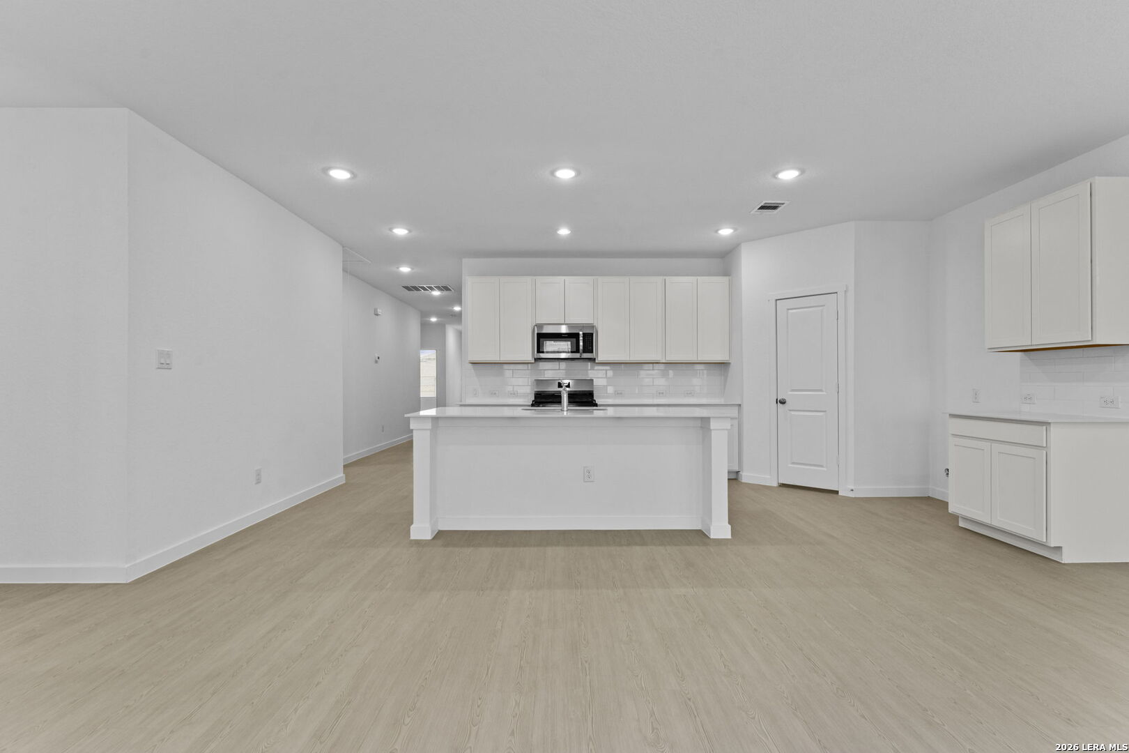 5003 Mission Tejas Road Marion, TX 78124 - Photo 17 of 25 a large kitchen with stainless steel appliances kitchen island granite countertop a large counter top and a stove top oven