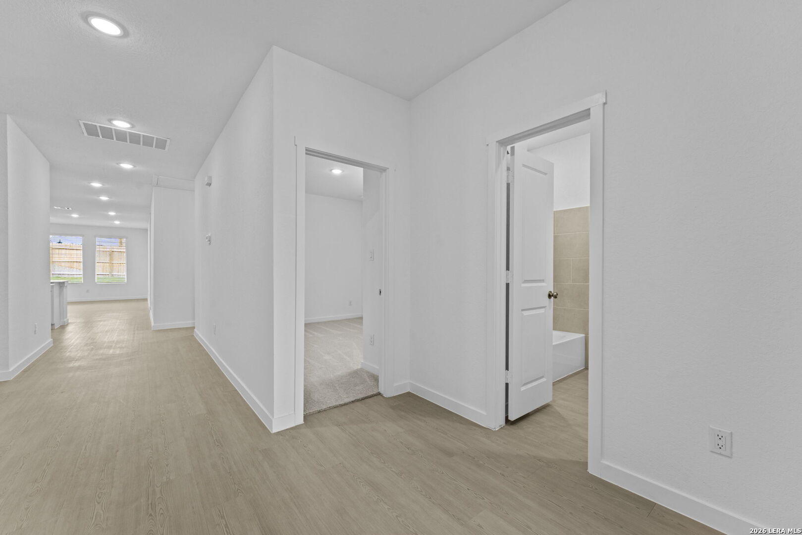 5003 Mission Tejas Road Marion, TX 78124 - Photo 2 of 25 an empty room with windows and entrance