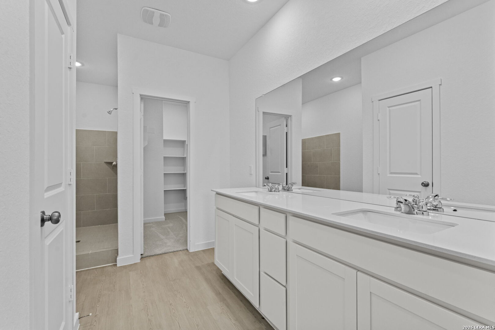 5003 Mission Tejas Road Marion, TX 78124 - Photo 22 of 25 a bathroom with a double vanity sink mirror and double