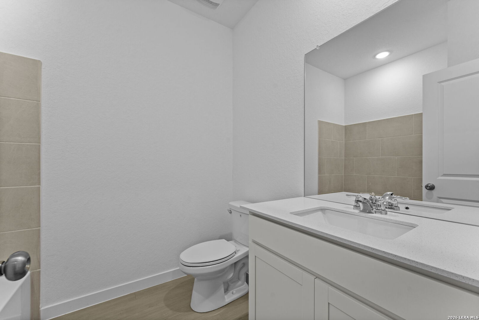 5003 Mission Tejas Road Marion, TX 78124 - Photo 6 of 25 a bathroom with a sink a toilet and mirror