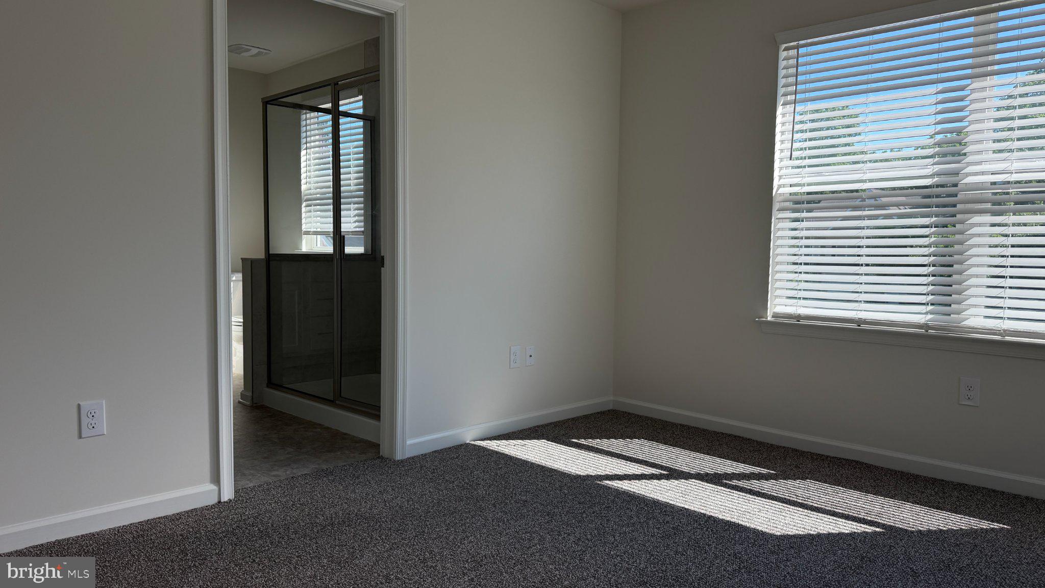 78 Tansboro Road Berlin, NJ 08009 - Photo 23 of 41 an empty room with windows and closet