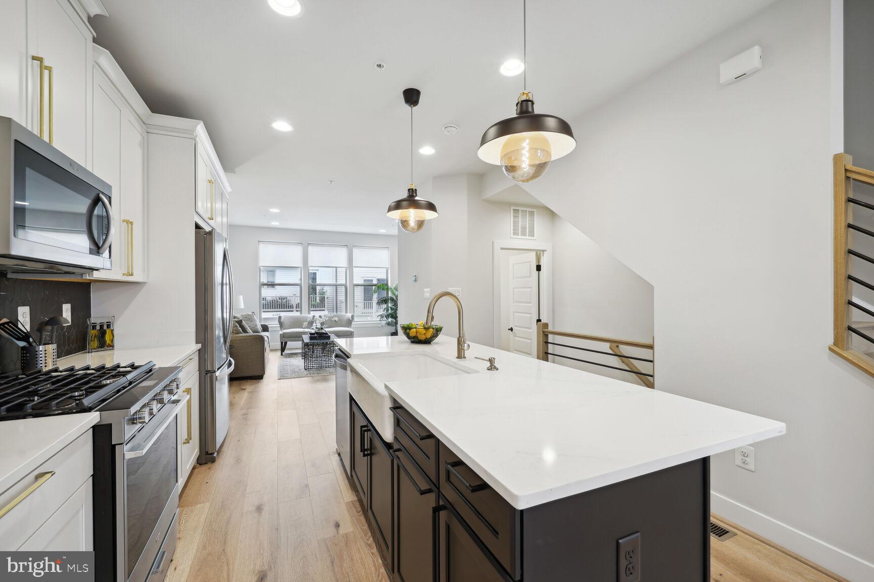 5104 Randolph Road Rockville, MD 20852 - Photo 8 of 62 Kitchen Island with Gleaming Quartz Tops