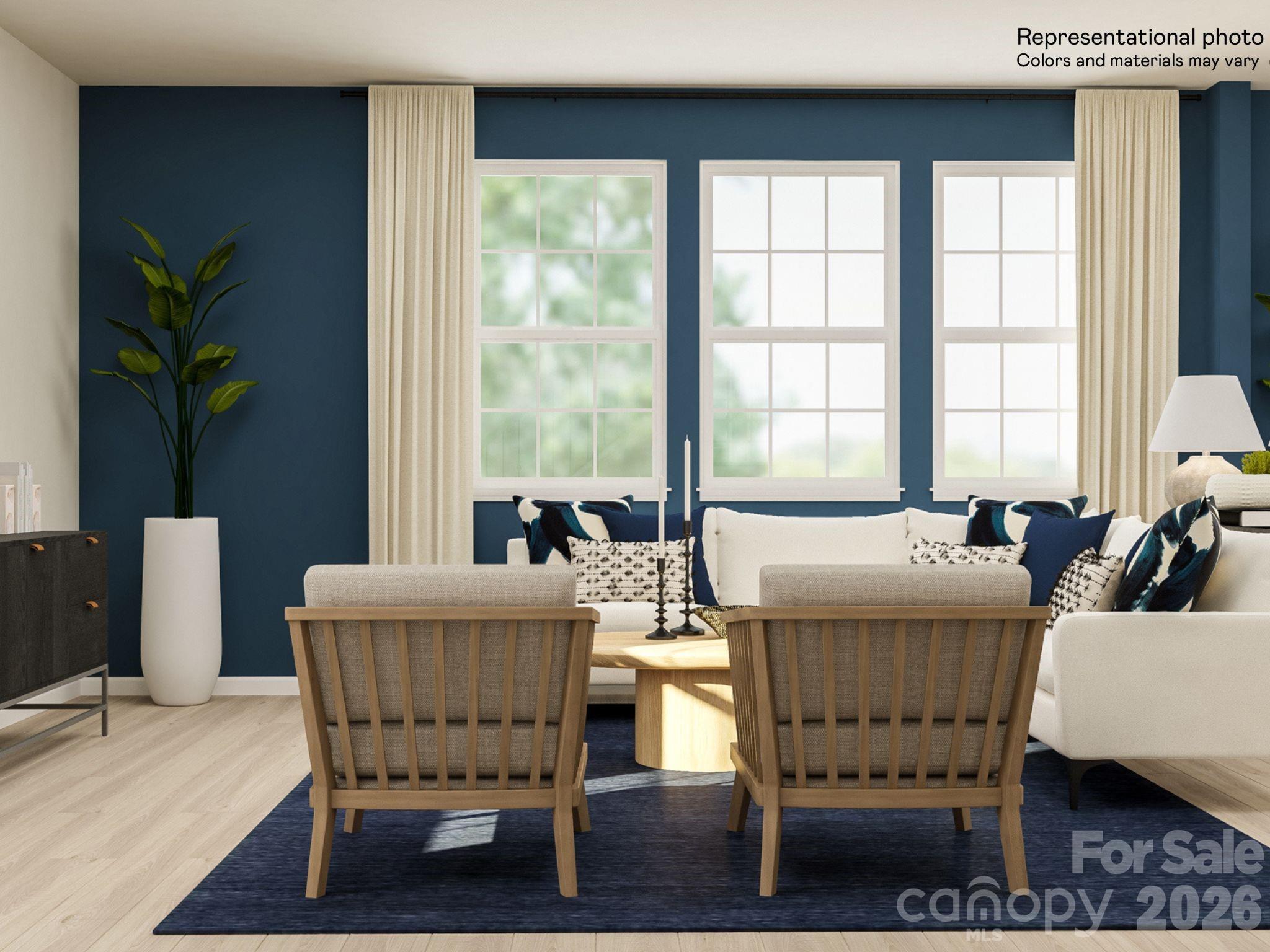 7002 Juneberry Way Maiden, NC 28650 - Photo 16 of 25 a living room with furniture a table and a large window