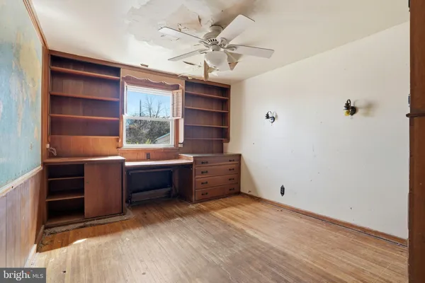 a room with furniture and a window