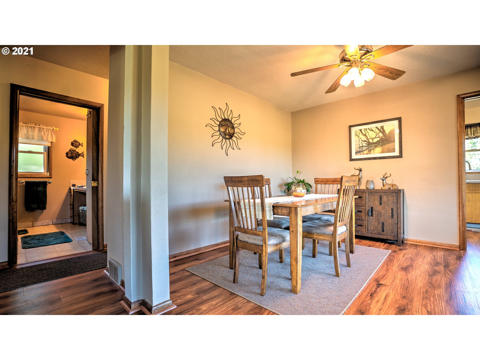 12996 South Warnock Road Oregon City, OR 97045 - Photo 8 of 32 a upper view of a dining room with furniture and wooden floor