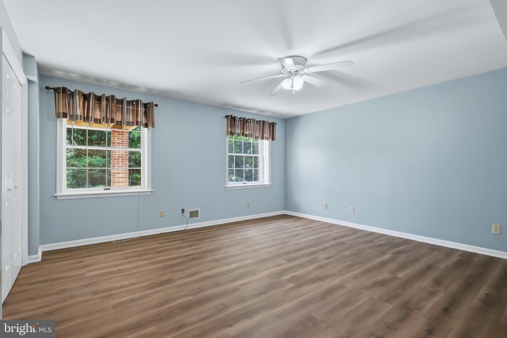 23500 River Road Lexington Park, MD 20653 - Photo 54 of 92 a view of an empty room with wooden floor and a window