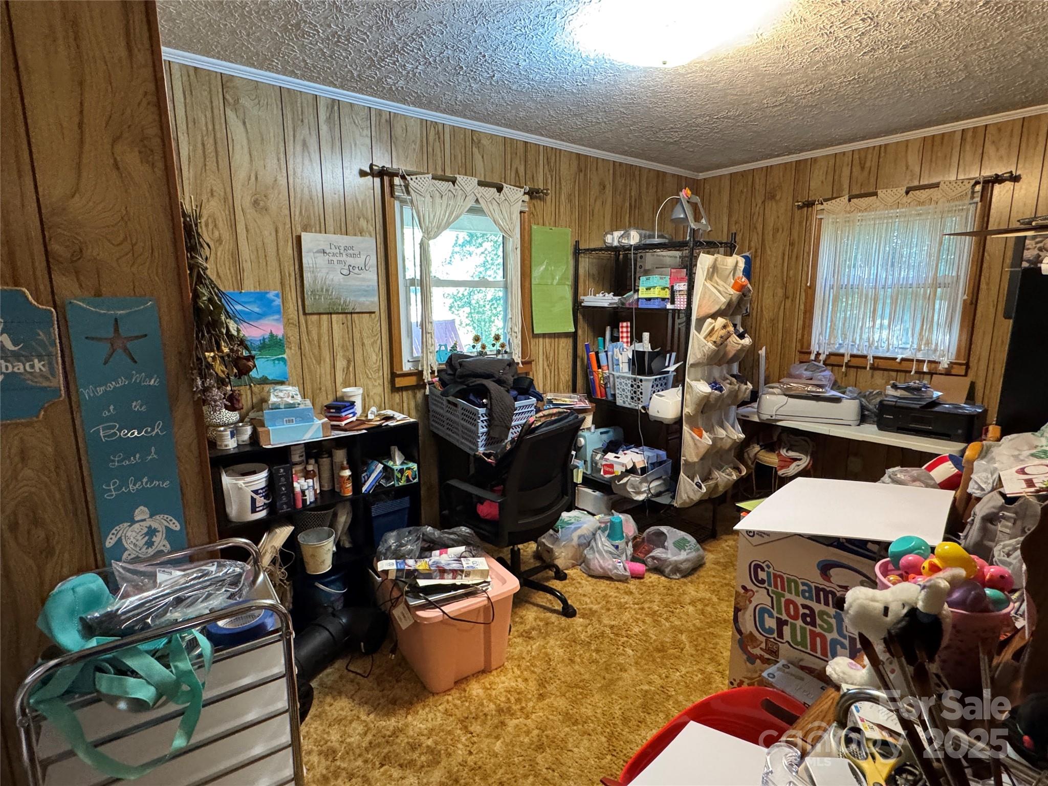 3957 Hollywood Ridge Road Lenoir, NC 28645 - Photo 16 of 20 a room with furniture or couch and a window