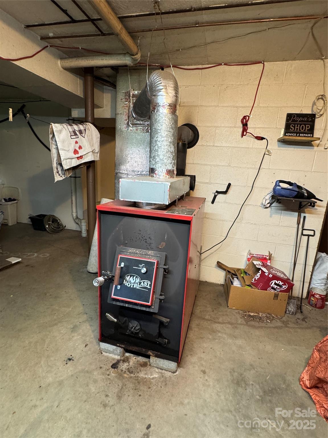3957 Hollywood Ridge Road Lenoir, NC 28645 - Photo 18 of 20 a living room with furniture and a fireplace