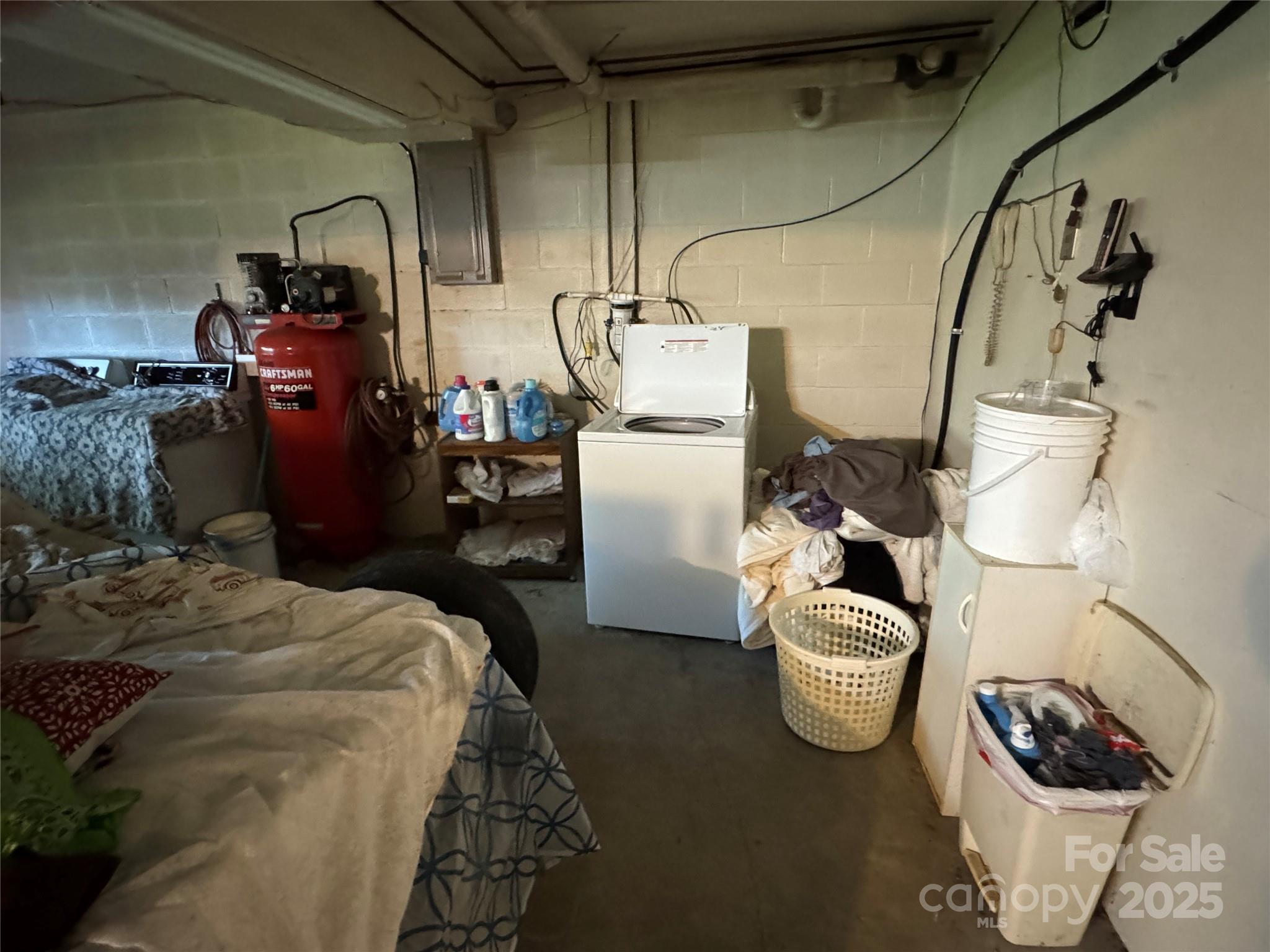 3957 Hollywood Ridge Road Lenoir, NC 28645 - Photo 19 of 20 a bed room with furniture and a air conditioner