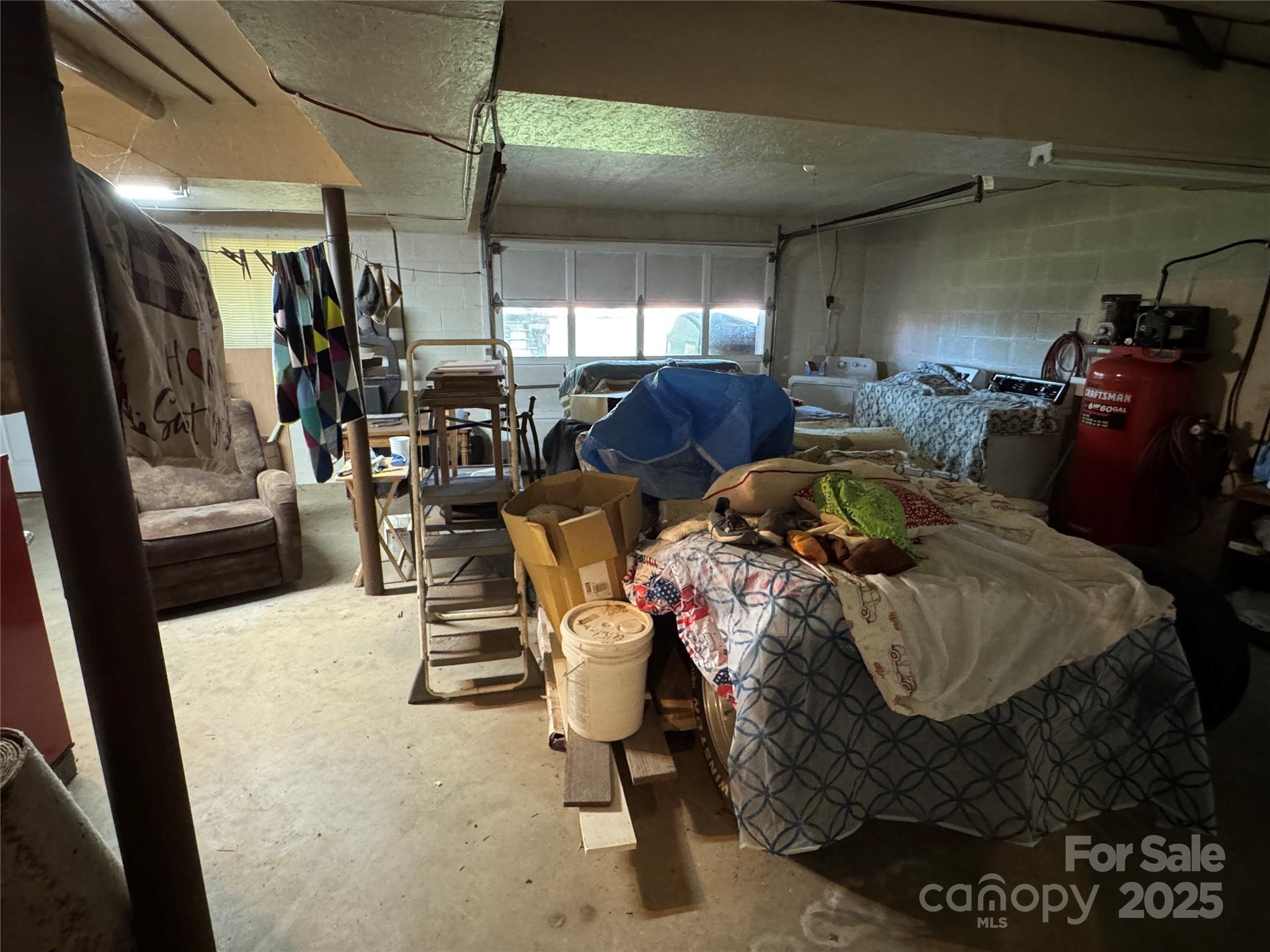 3957 Hollywood Ridge Road Lenoir, NC 28645 - Photo 20 of 20 a room with gym equipment and a view of living room