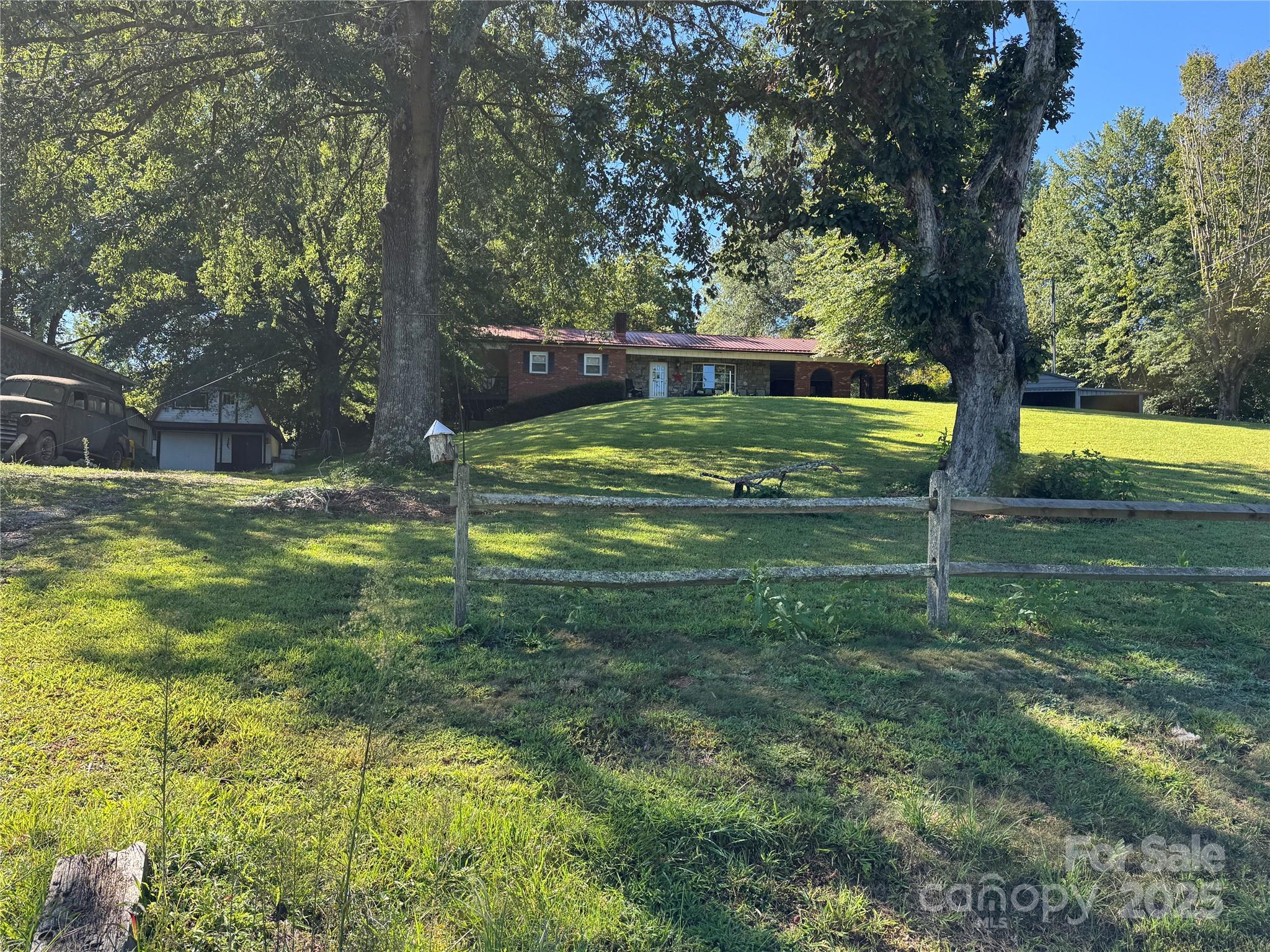 3957 Hollywood Ridge Road Lenoir, NC 28645 - Photo 4 of 20 a view of swimming pool with a yard
