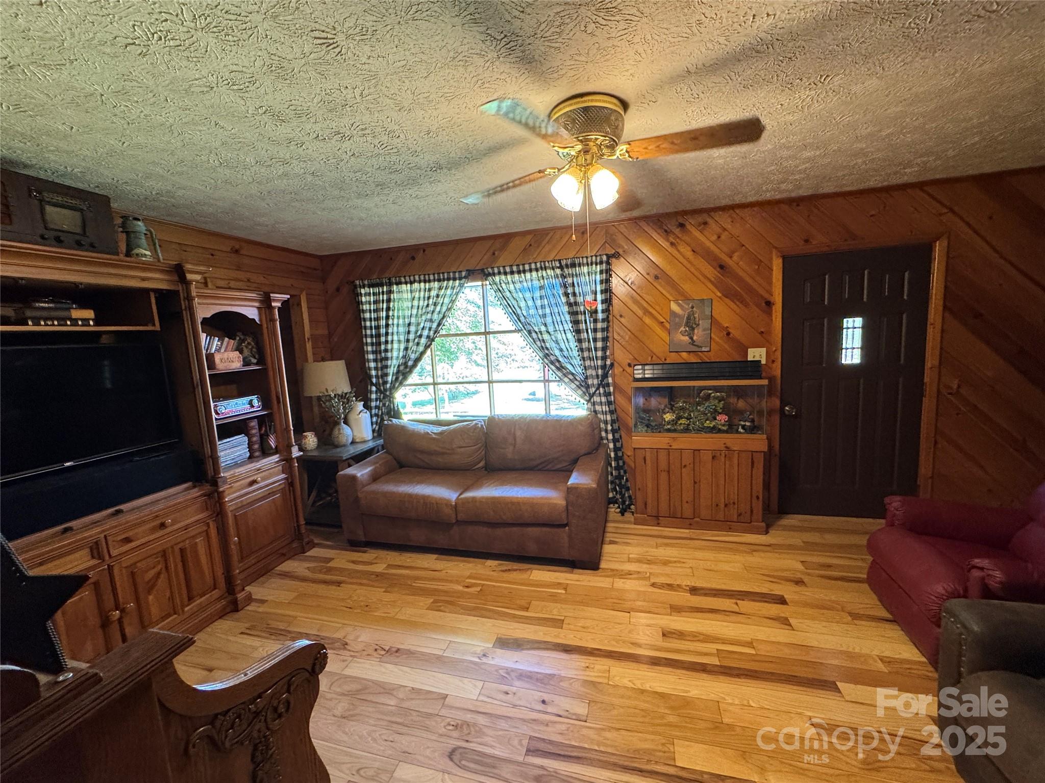 3957 Hollywood Ridge Road Lenoir, NC 28645 - Photo 10 of 20 a bedroom with furniture and a window