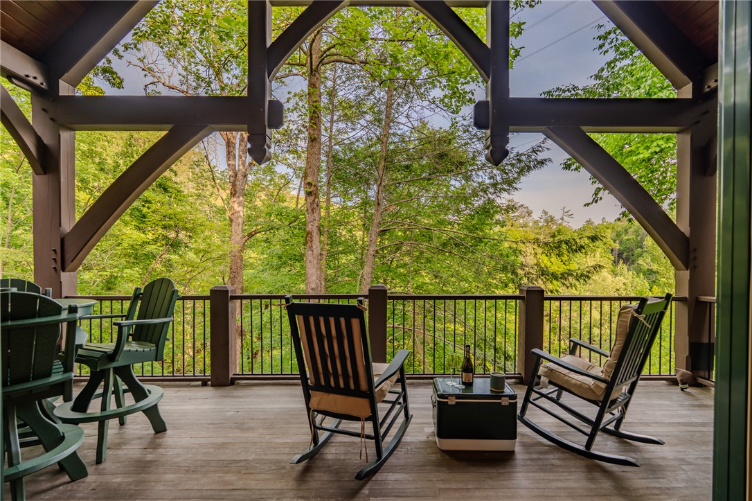 102 State Rd S-39-143 Sunset, SC 29685 - Photo 15 of 47 This spacious deck provides serene outdoor living amidst nature's embrace.