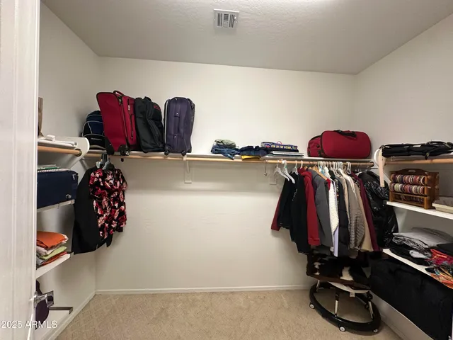 a living room with stairs and a furniture