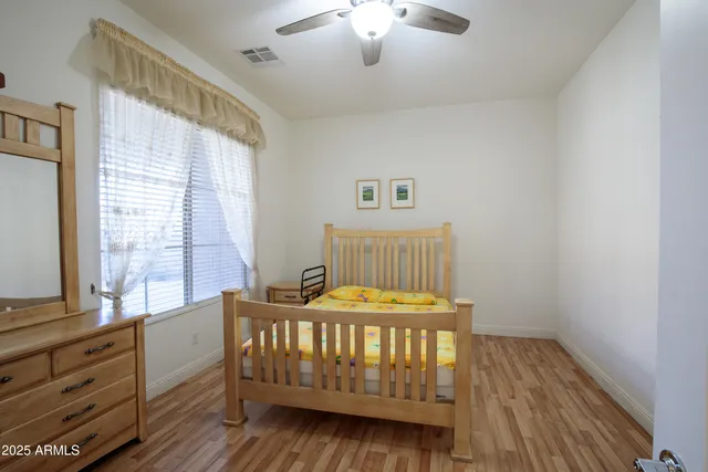 a bathroom with a double vanity sink mirror and double