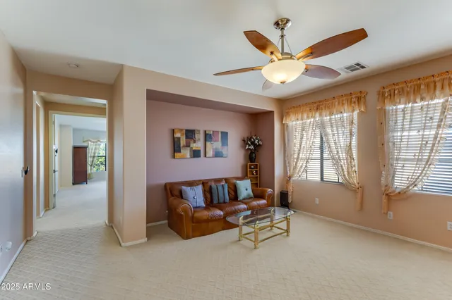 a bathroom with a double vanity sink toilet and shower