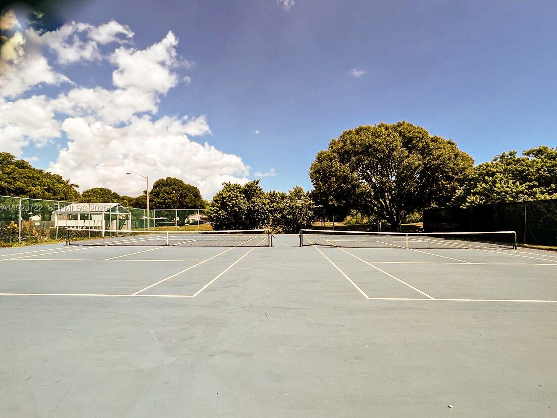11 Crossings Circle, Unit C Boynton Beach, FL 33435 - Photo 20 of 20 a view of tennis court
