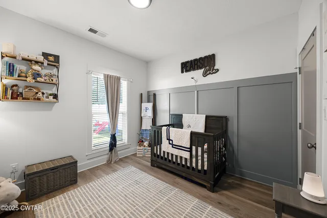 a bed room with a bed and a couch