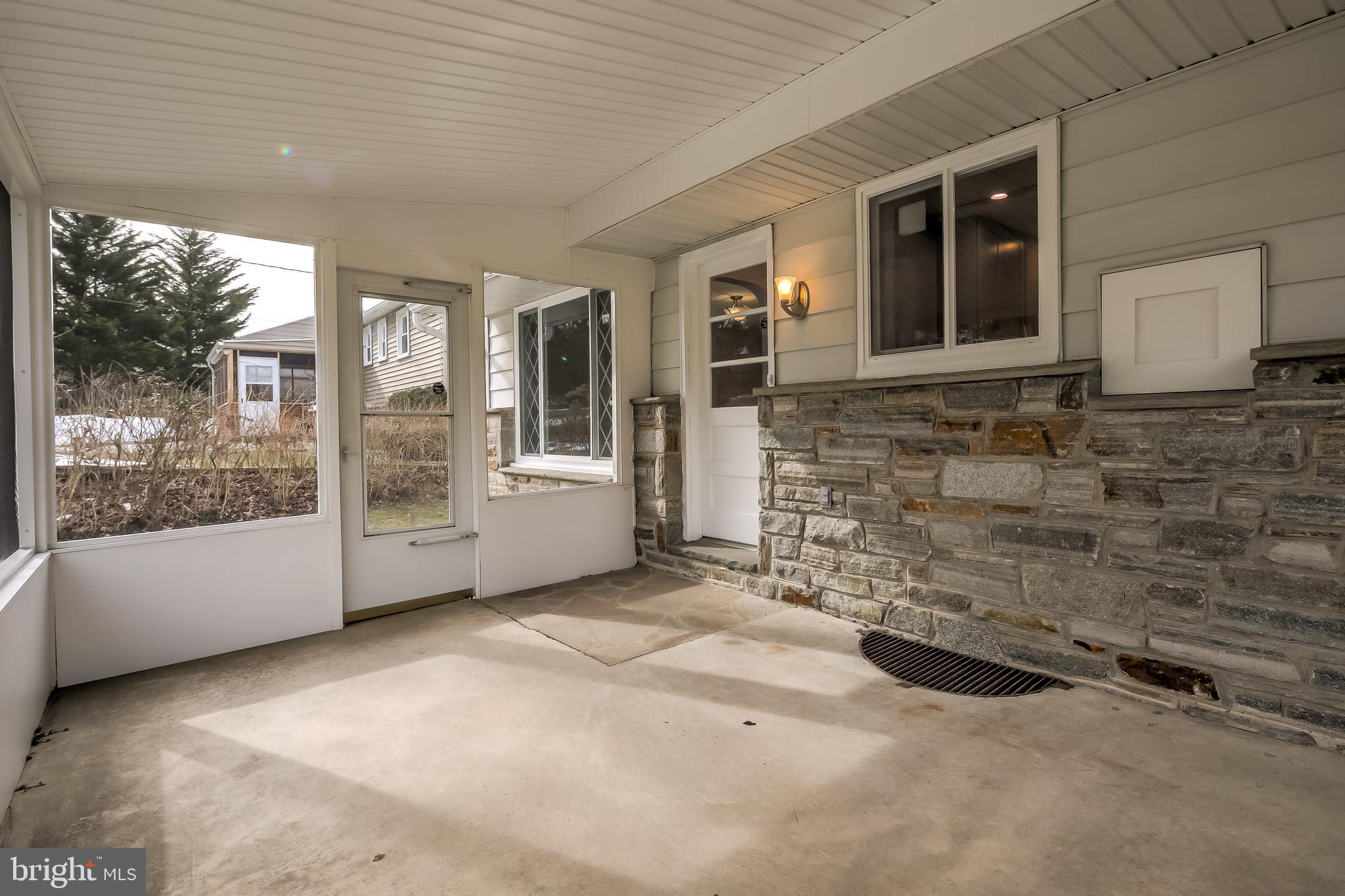 25 Croftley Road Lutherville-Timonium, MD 21093 - Photo 12 of 37 Access to Backyard from Rear Sunroom
