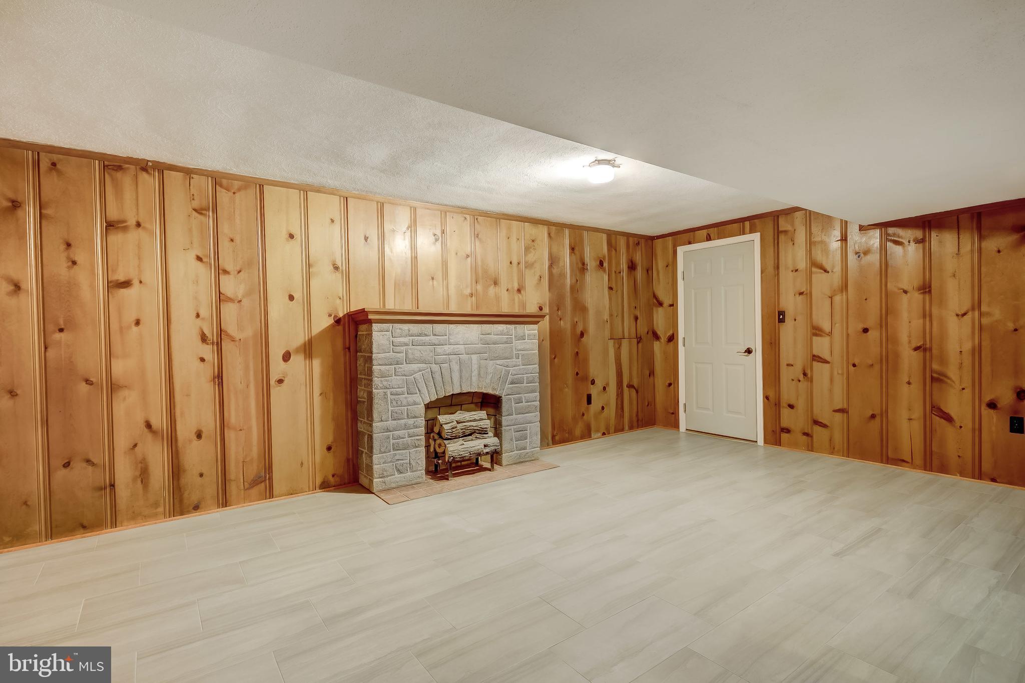 25 Croftley Road Lutherville-Timonium, MD 21093 - Photo 23 of 37 Lower Level Decorative Fireplace