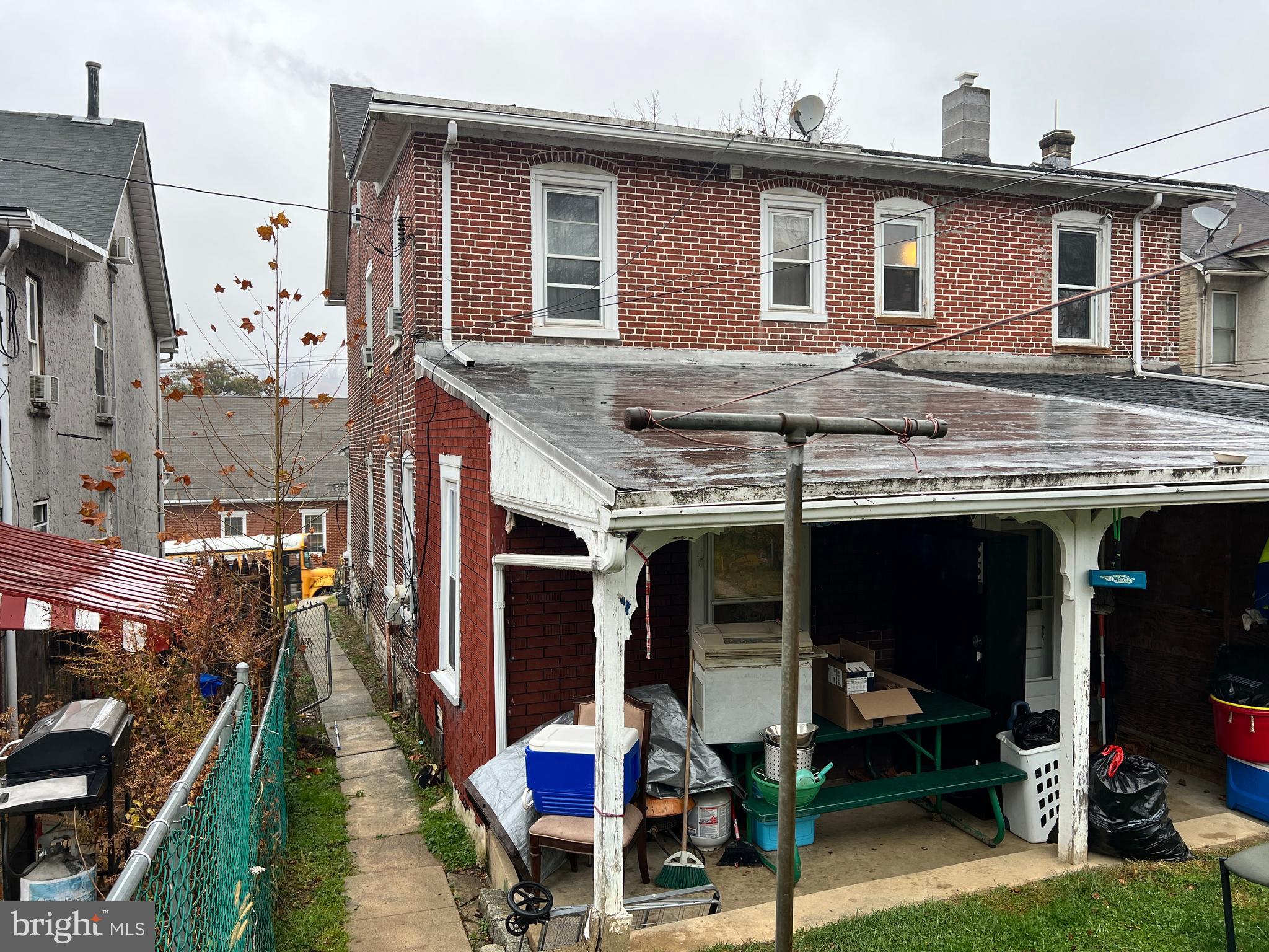622 Walnut Street Coatesville, PA 19320 - Photo 3 of 3 a front view of a house with a porch