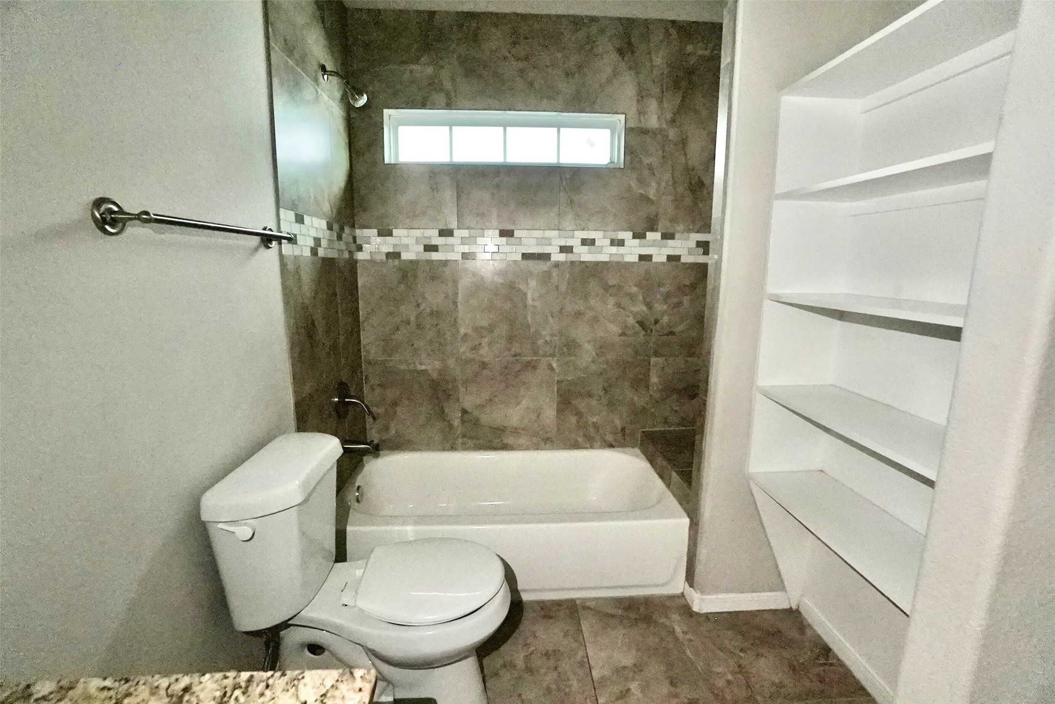 2523 Kirk Street, Unit B Houston, TX 77026 - Photo 14 of 16 a bathroom with a toilet and a shower